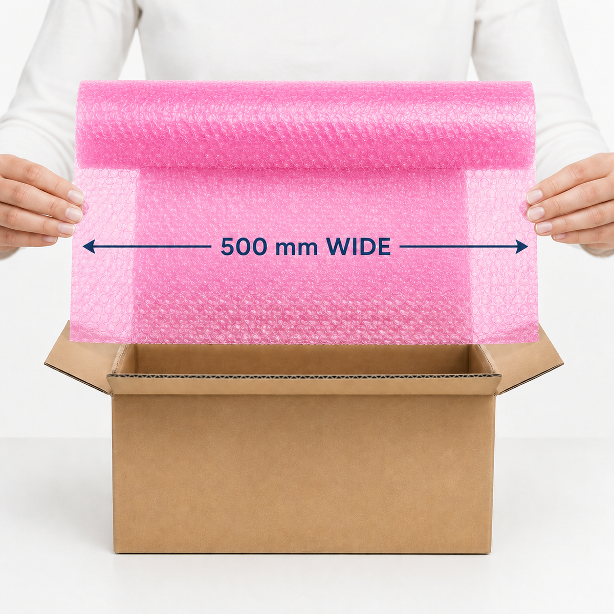 Pink coreless bubble wrap shown at 500 mm wide